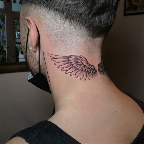 angel wings neck tattoo|angel wings back tattoo male.